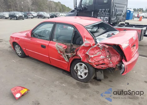 2005 Hyundai Accent Gls from USA, damaged, VIN KMHCG45C65U605963